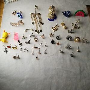 Large Set Of Individual Stud Earrings